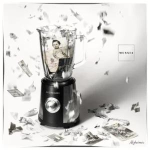An Alzheimer's brand blender without a lid shreds old photographs and the crumbled memories spill chaotically everywhere. "Alzheimer" Mussia song photo cover. Photo by Jordi Roca Zanuy.