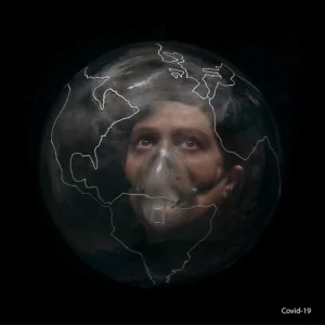 Covid-19 photo illustration. Inside a transparent globe, the head of a woman wearing an oxygen mask looks outward with eyes full of hope and concern. 1º Prize Jordi Roca Zanuy ASMP (American Society of Media Photographers) 2023. Photo by Jordi Roca Zanuy.